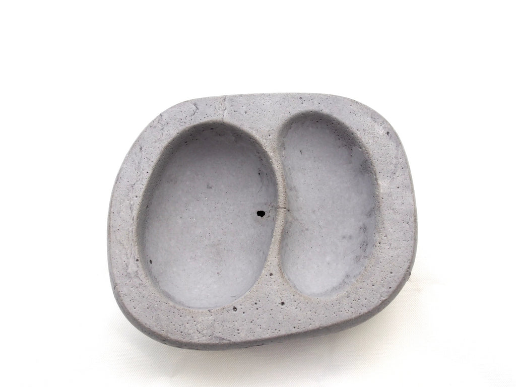 The Stephanie bowl, small grey concrete, two nestled indentations, top view